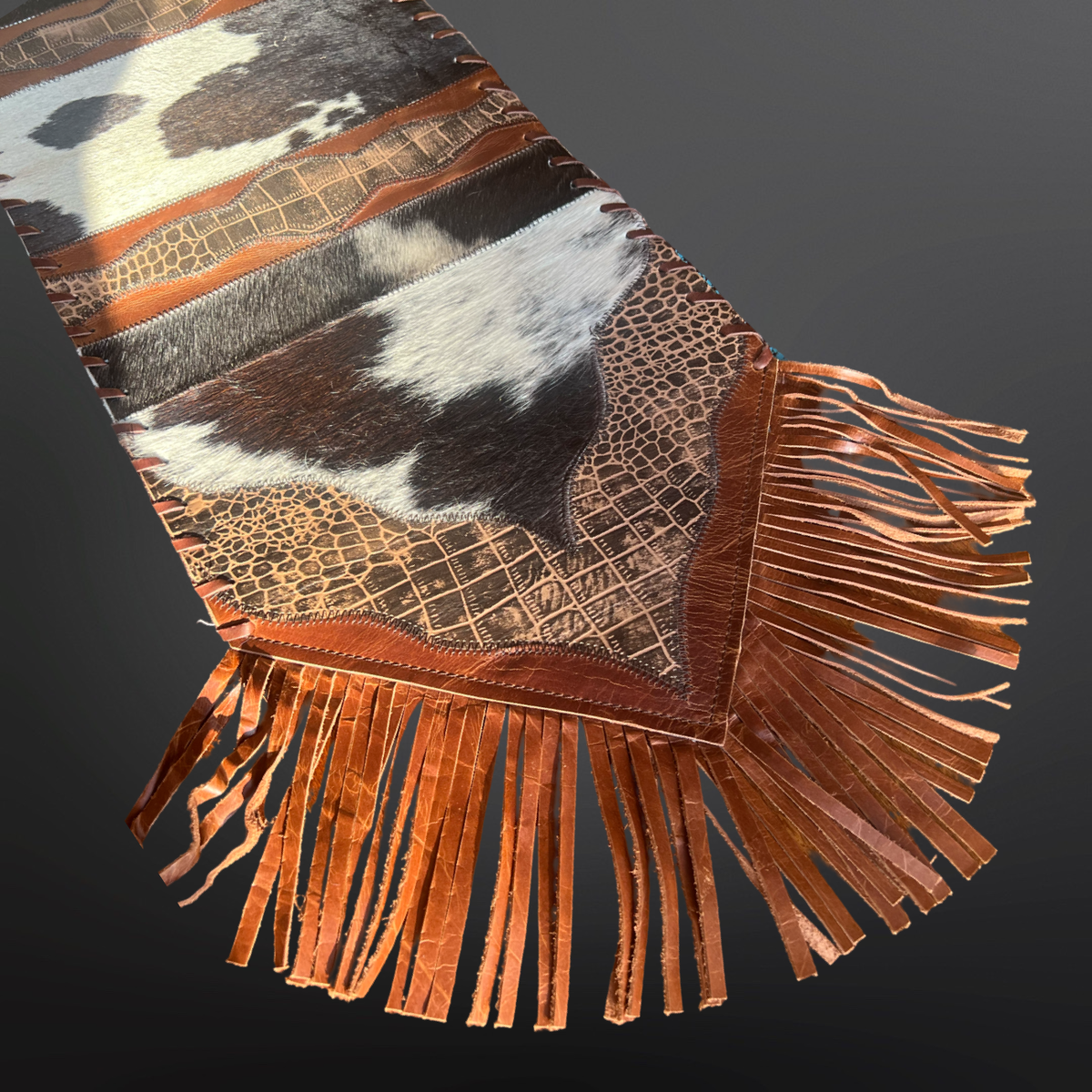 Cowhide table runner with fringe