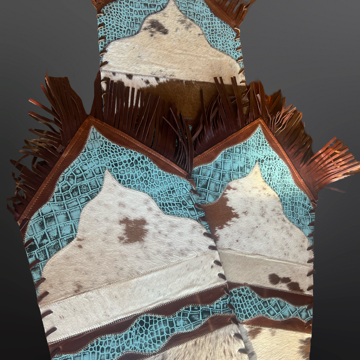 Three table runners with leather and cowhide.