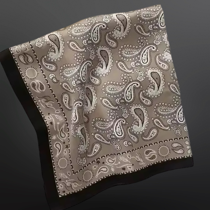 Patterned scarf with paisley design on a dark background