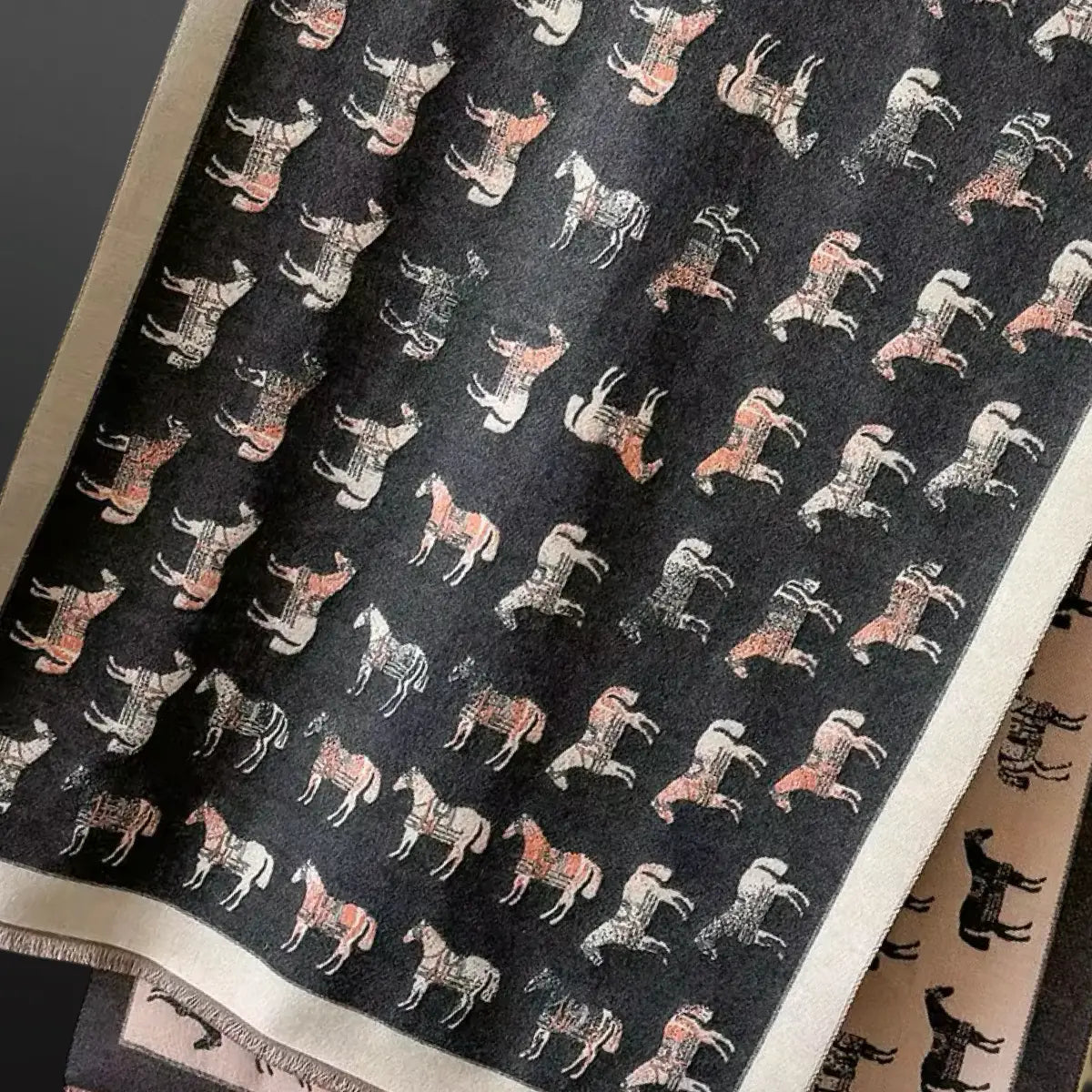 Scarf with a pattern of horses on a black background