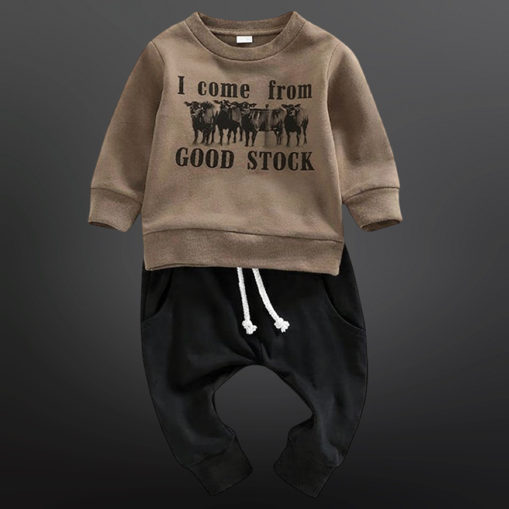 Children's brown sweatshirt with graphic and text, paired with black pants on a dark background